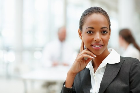 african-female-CA-sits-desk